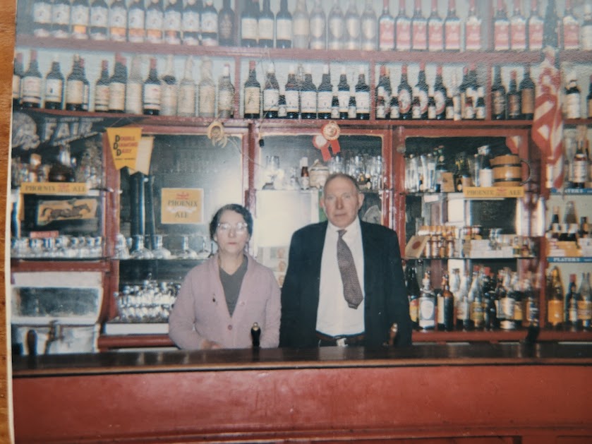 Michael and His Two Sons Holding a Photo of Andrew Michael and His Two Sons Holding a Photo of Andrew